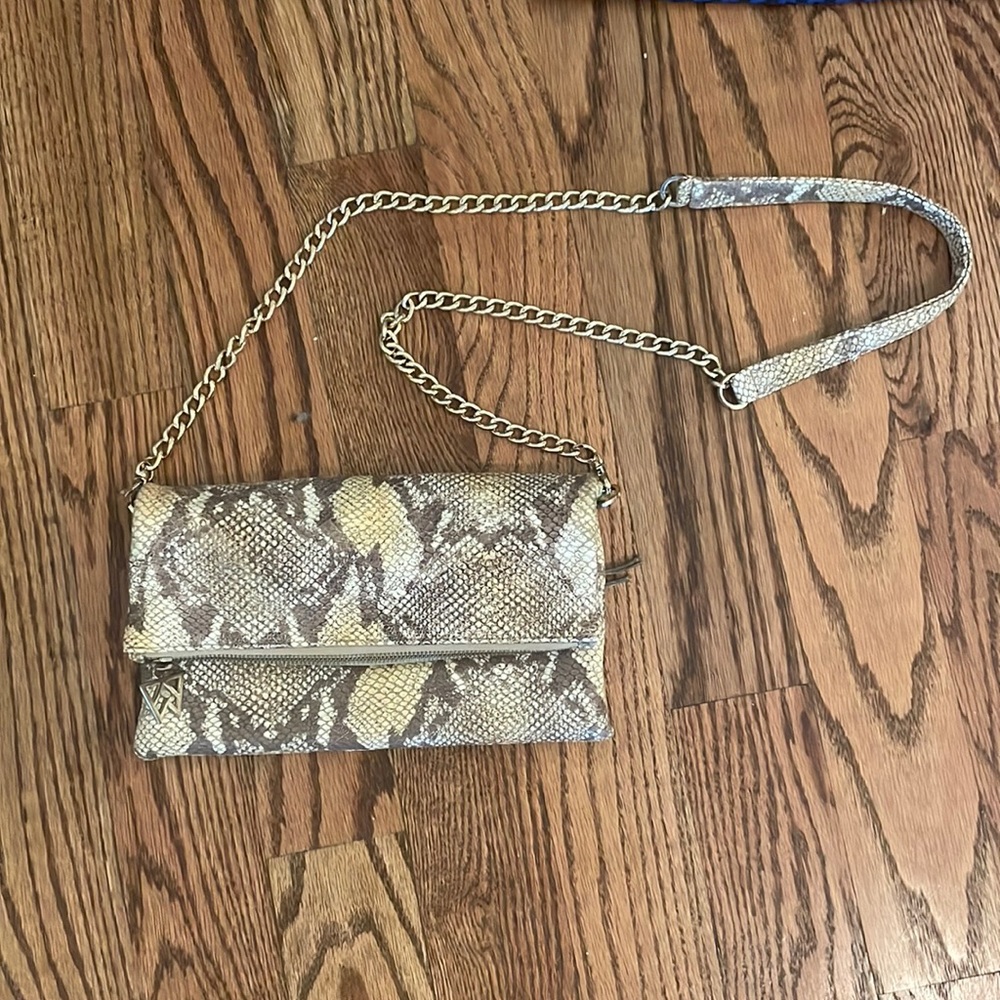 Snakeskin Kelly Wynn bag. 10” x 5”
